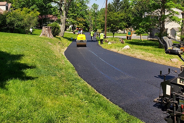 Paving a long residential driveway